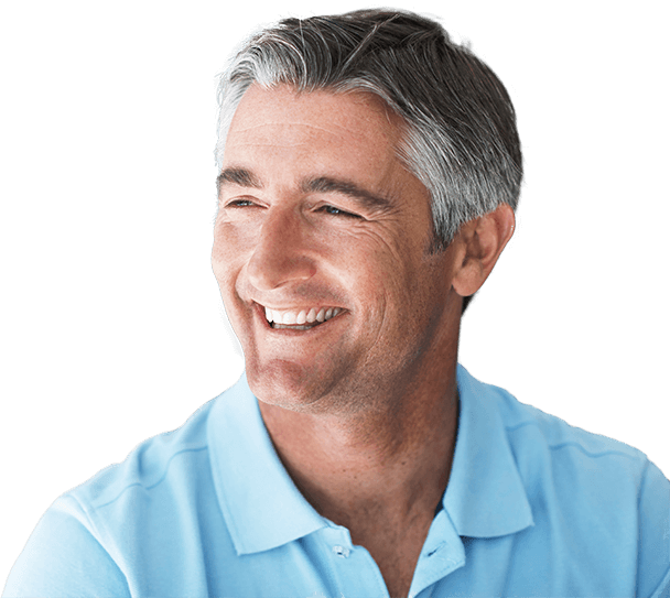 Smiling senior man in front of dental office