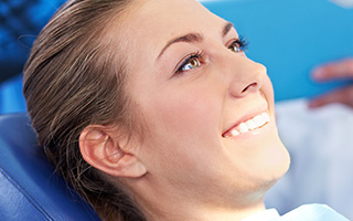 Smiling woman in dental chair