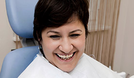 Smiling older woman in dental chair