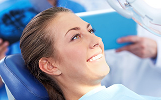 Smiling woman in dental chair